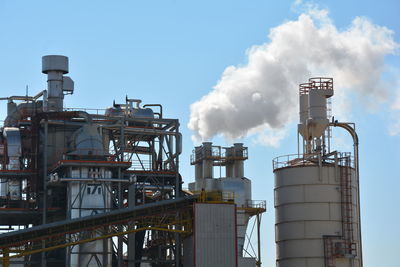 Smoke stack against sky