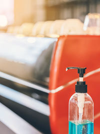 Close-up of red wine bottle on table