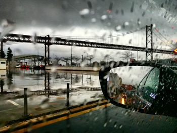 Close-up of wet road during rainy season