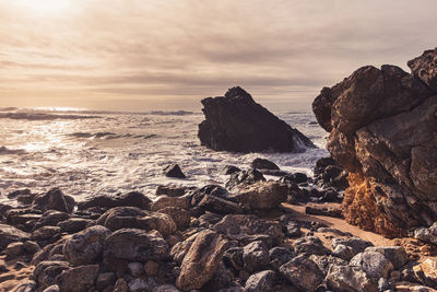 Scenic view of sea against sky during sunset