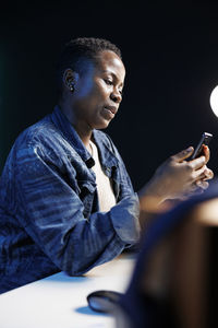 Young man using mobile phone