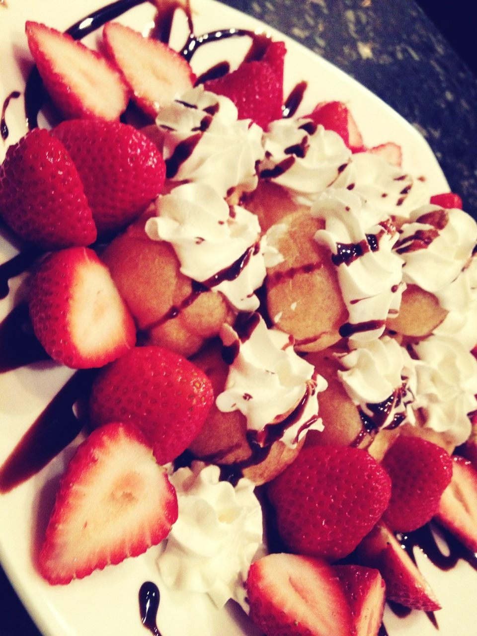 food and drink, food, freshness, indoors, ready-to-eat, still life, healthy eating, plate, indulgence, strawberry, sweet food, close-up, red, high angle view, table, fruit, serving size, dessert, temptation, bowl