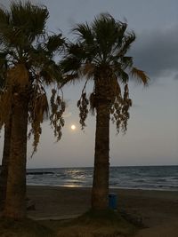 Scenic view of sea against sky at sunset