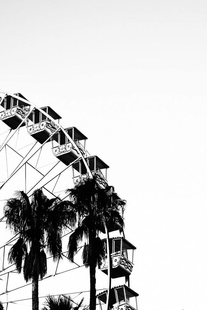 LOW ANGLE VIEW OF FERRIS WHEEL AGAINST SKY