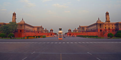 View of buildings against sky at sunset