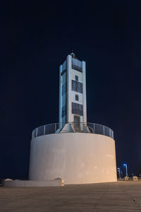 Low angle view of building against sky at night