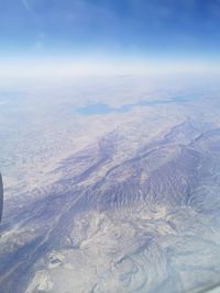 Aerial view of dramatic landscape against sky