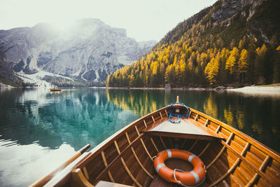 Scenic view of lake and mountains seen through boat