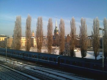 Railroad track against blue sky