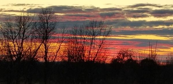 Scenic view of dramatic sky during sunset