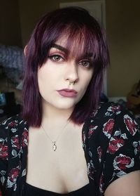 Portrait of beautiful young woman with dyed hair