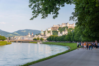 The salzburg skyline with hohensalzburg fortress and salzach river in summer, austria.