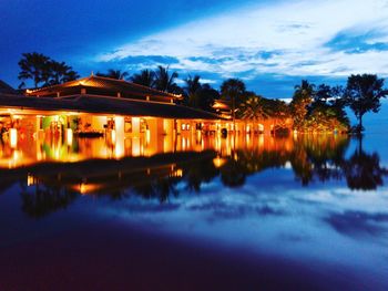 Scenic view of lake against sky at dusk