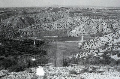 Scenic view of land against sky