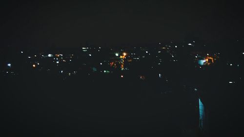 View of illuminated city at night