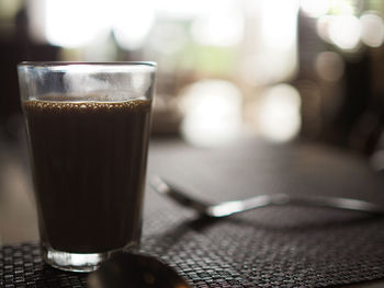 Close-up of coffee cup on table