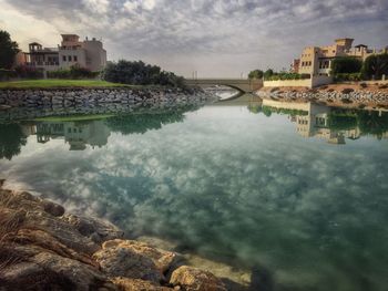 View of river against cloudy sky