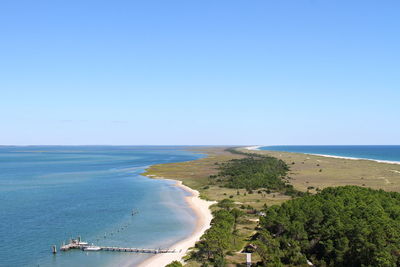 High angle view of beach against blue sky