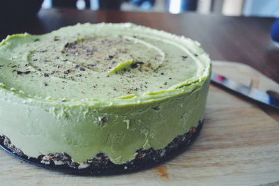 Close-up of lime pie on chopping board