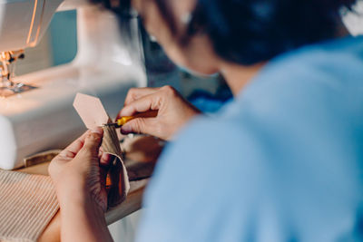 Midsection of woman working