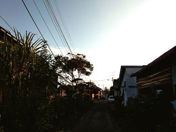 Street amidst buildings against sky