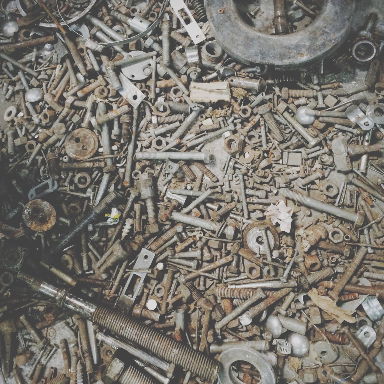 full frame, backgrounds, metal, high angle view, abundance, indoors, metallic, old, large group of objects, pattern, textured, wood - material, no people, close-up, obsolete, abandoned, rusty, day, design, art and craft