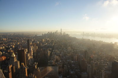 High angle view of city buildings against sky