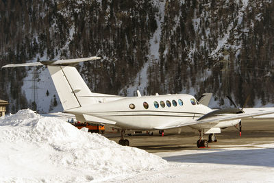 Private jets and aircrafts in the airport of engadine st moritz in winter time