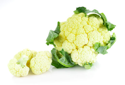 Close-up of fresh vegetables against white background