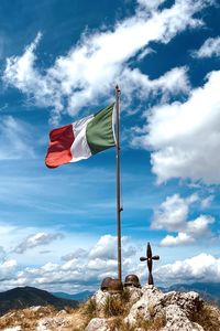Low angle view of flag against sky