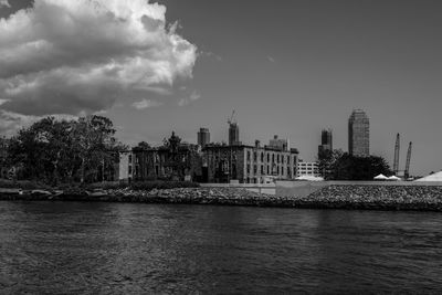 Buildings in distance with waterfront