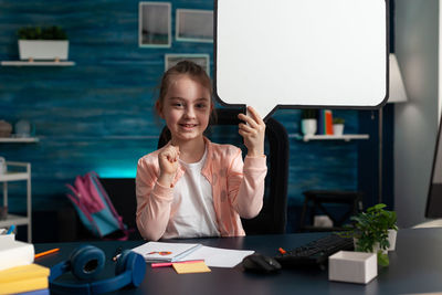 Businesswoman working at table