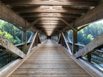 View of footbridge in forest