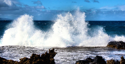 Waves splashing on rocks