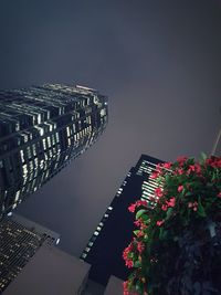 High angle view of illuminated buildings against clear sky