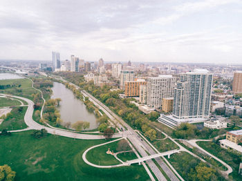 Aerial view of cityscape against sky