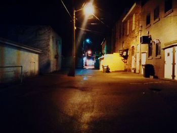 Illuminated street lights at night