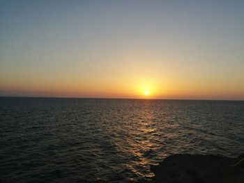 Scenic view of sunset over sea