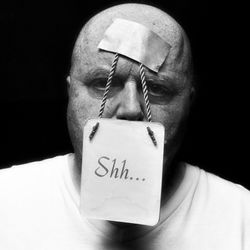 Close-up portrait of man with text