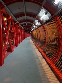 Empty footbridge and bicycle in tunnel