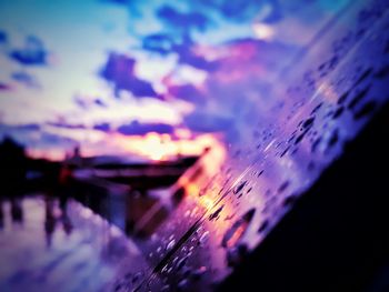 Reflection of clouds in water at sunset