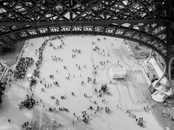 High angle view of people under eiffel tower