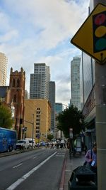 Road in city against sky