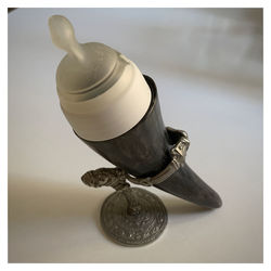 Close-up of a bird on table