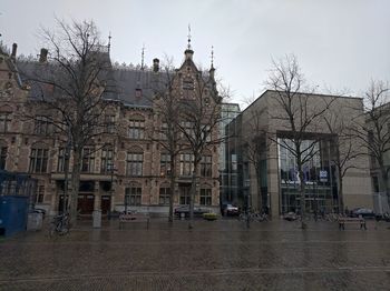 Buildings in city against sky