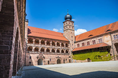 View of historic building against blue sky