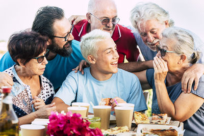 Cheerful family sitting at restaurant