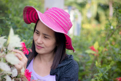 Portrait of girl with pink flowers