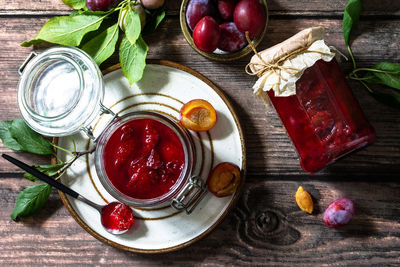 High angle view of fruits in jar on table