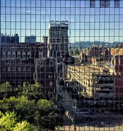 Close-up of cityscape against sky